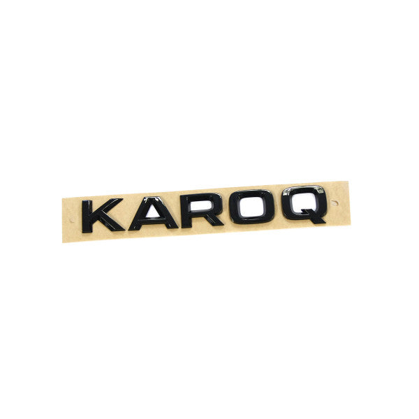 Emblem/logo til Skoda Karoq Black Glossy i svart blank ABS-materiale, montert på bakluke