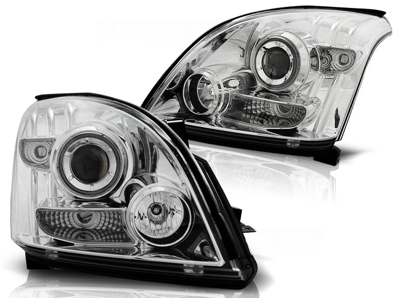 Frontlykter Angel Eyes Chrome CCFL til Toyota Land Cruiser 120 03-09 sett rett forfra på hvit bakgrunn.