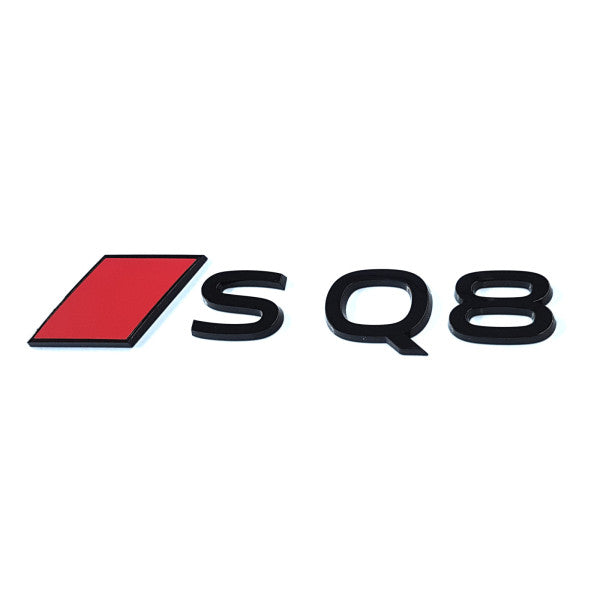 Svart blankt emblem/logo til Audi SQ8 med røde detaljer, perfekt for karosseri og grillmontering