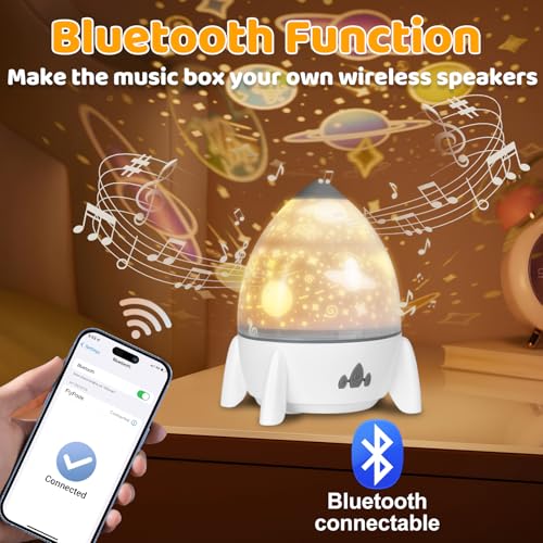 Stjernehimmel Lampe rakett 15cm projiserer stjerner i gult og hvitt, med Bluetooth-tilkobling via mobil.