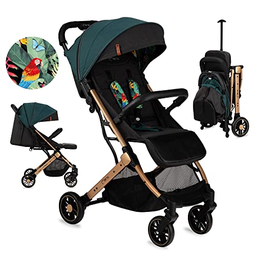 Baby Vogn sammenleggbar i grønn og svart med 5-punktssele, vist stående fra siden mot hvit bakgrunn.