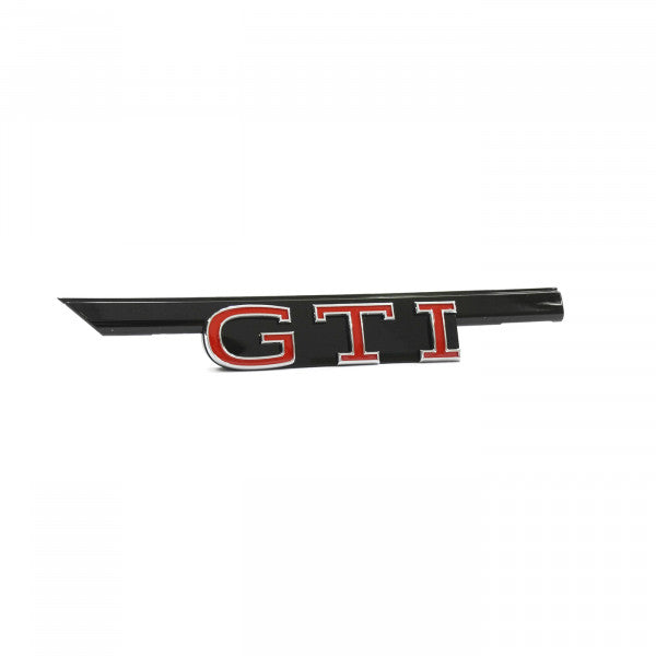 Emblem Vw Golf 8 (5H) GTI > Glossy Chrome / Black Glossy / Tornado Red - sett forfra