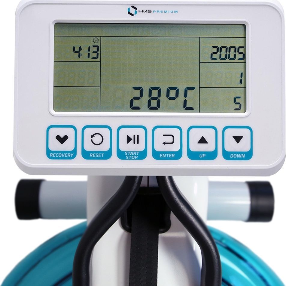 Romaskin Vann display i hvit og blå plast med sorte håndtak, viser tid, temperatur og kontrollknapper foran.