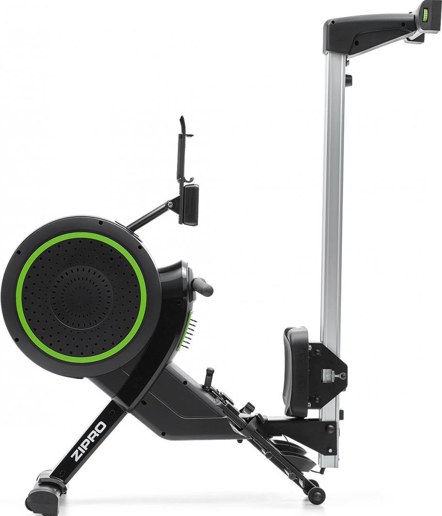 Romaskin Trening vises sammenfoldet og oppreist fra siden, sort med grønne detaljer og sølvfarget skinne.