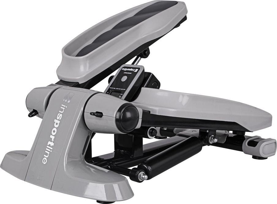 Stepper i grått og svart metall og plast, sett fra siden med LCD-display, støtte og to brede fotplater.