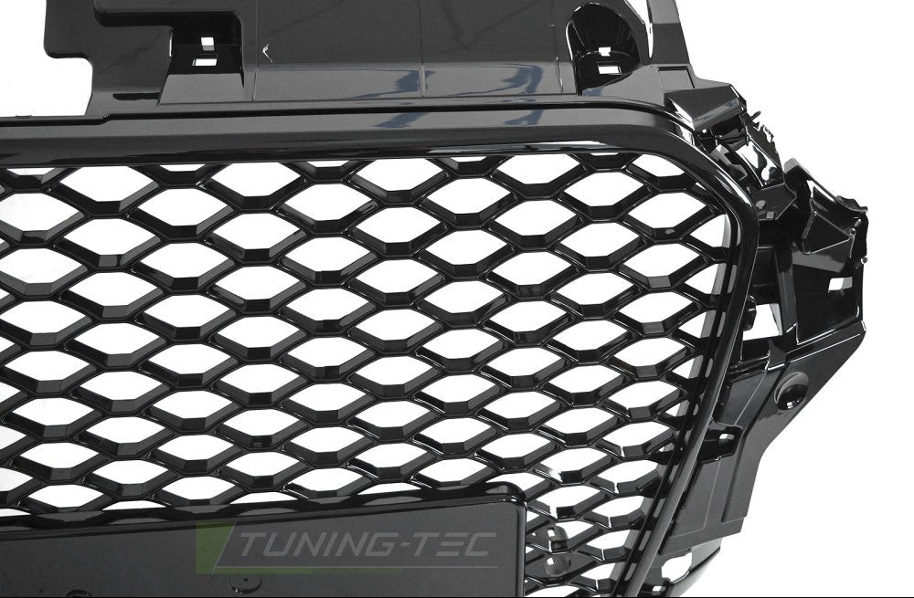 Nærbilde av honeycomb-mønster og glans svart finish på frontgrill til Audi A3 8V med PDC-sensorfester
