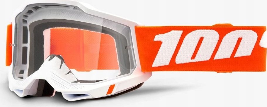 Motocrossbriller med hvit ramme, klar linse og bred oransje stropp med hvit tekst, sett fra skrå front.