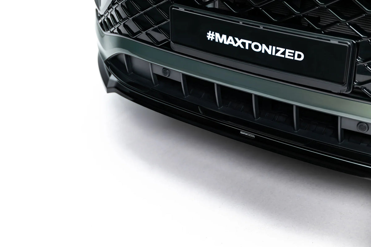 Detalj av blank sort frontsplitter til Volkswagen Tayron Mk1