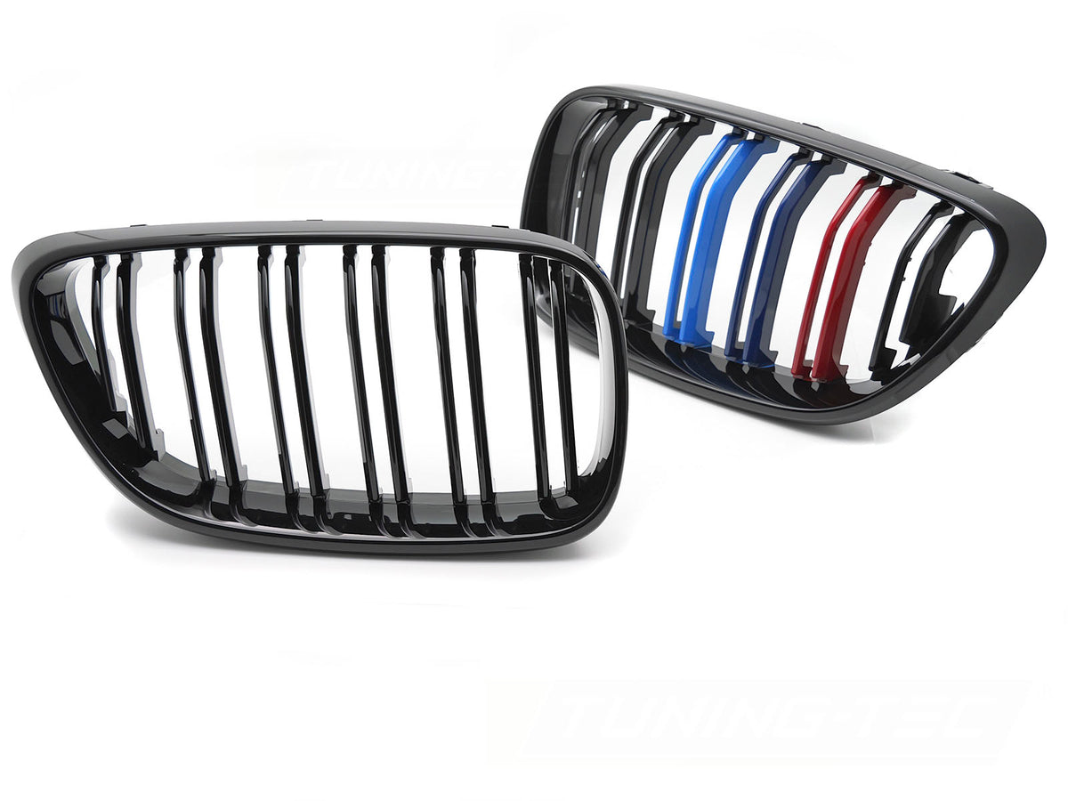 Svart sportsgrill med tri-colour dobbeltribbe montert på BMW 2-serie F22 frontparti