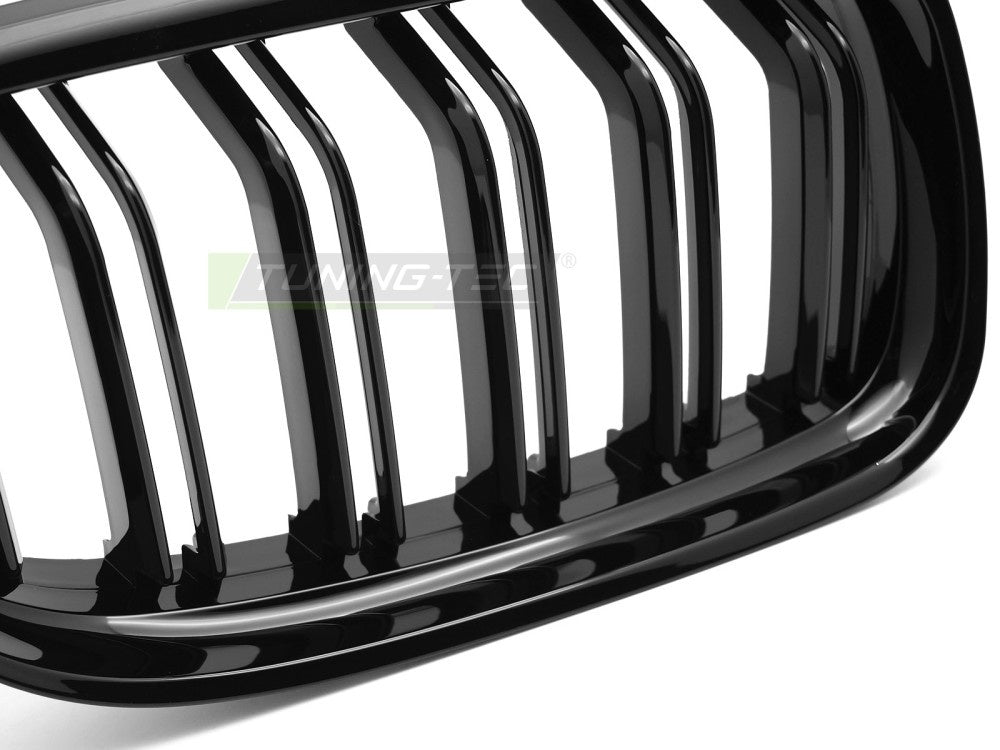 Nærbilde av blank svart grill med doble sprosser for BMW E90 E91 LCI
