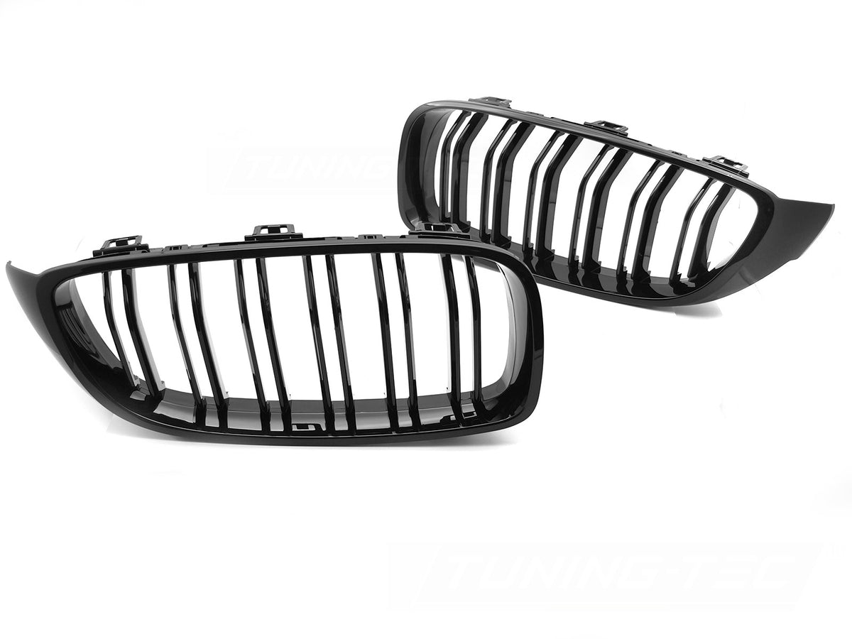 Dobbeltstavs sportsgrill i blank svart montert på BMW 4-serie F32 front