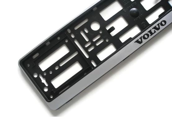 Emblem/logo til Volvo i svart og grå ABS-plast, passer foran og bak, 520x130 mm