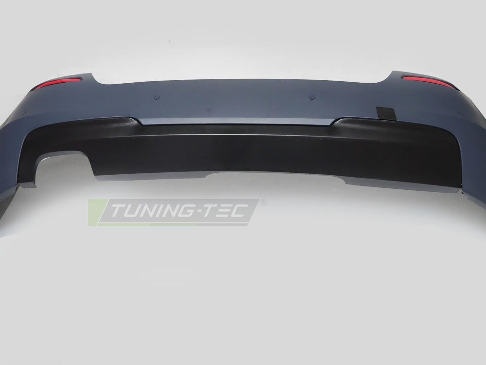 Detaljbilde av sport-bakfanger ZTBMC2 til BMW F10 med M-Sport-inspirert design