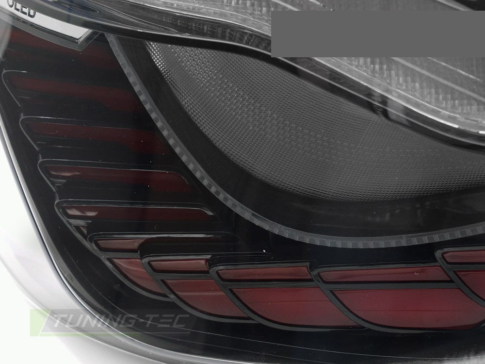 Nærbilde av sekvensiell LED-blinklys i OLED baklykter til BMW 5-Serie F10