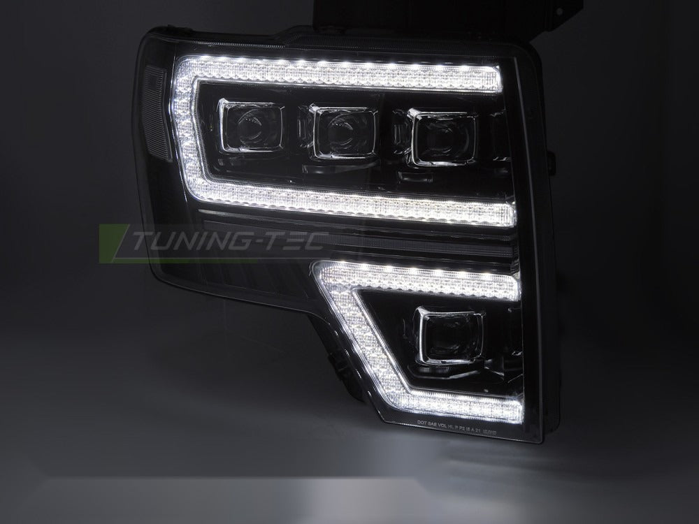 Detaljbilde av frontlykter Ford F150 MK12 08-14 med LED-detaljer.