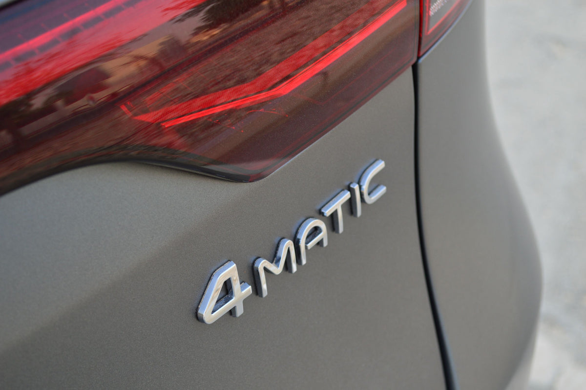 Emblem/logo til Mercedes 4Matic EQC Chrome-effect Edition i kromfinish, original Mercedes-Benz del for bakluke