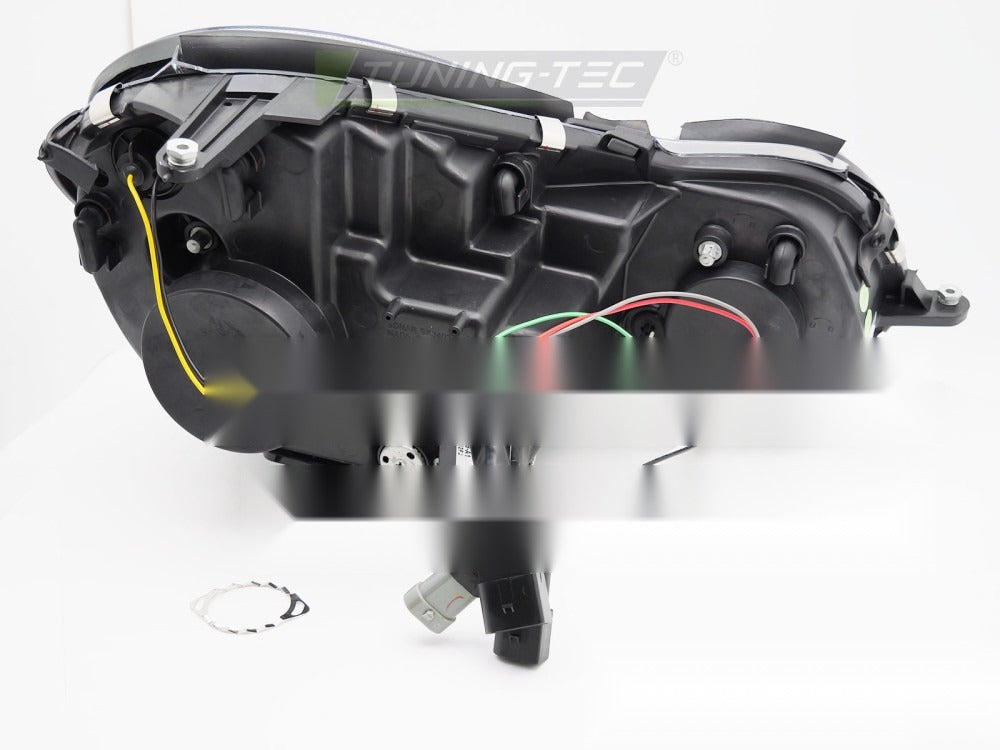 Detaljbilde av frontlykter Mercedes W211 03.02-04.06 med detaljer.