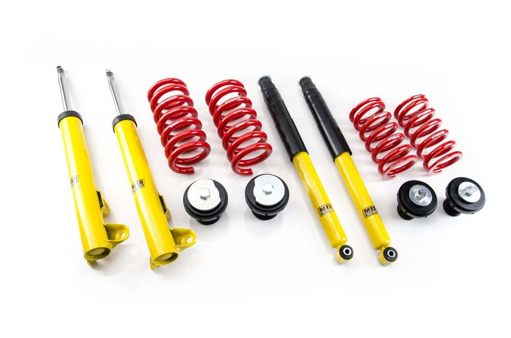Coilover-sett for Mercedes-Benz W124 sedan med gullfarget fjæringshus sett forfra