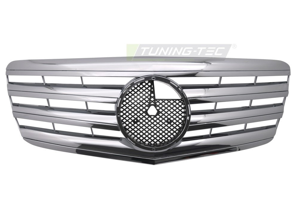 Detaljbilde av Grill Mercedes E-Klasse W211/S211 06-09 krom med lamellstruktur og emblemfeste.