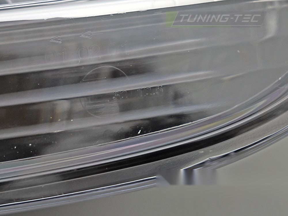 Frontlykter VW Golf V 03-09 med festedetaljer.