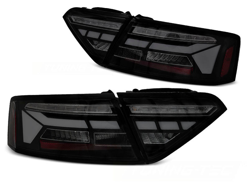 Baklykter LED Bar Black Smoke Sequential til Audi A5 11-16 OEM LED sett rett bakfra på hvit bakgrunn.