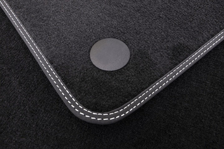 Unknown stoffmatter til Opel Combo C – antiskli og kantbeskyttelse