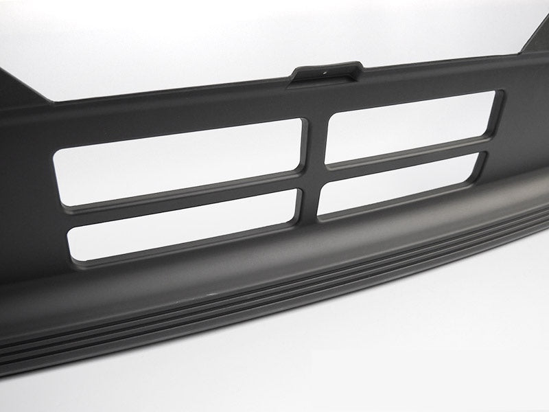 Detaljbilde av frontfanger sport style til BMW E30 overflatefinish