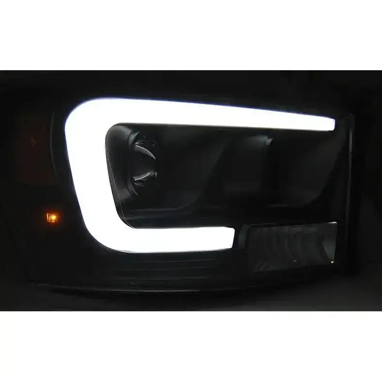 Frontlykter Dodge Ram 06-08 Tube Light Black