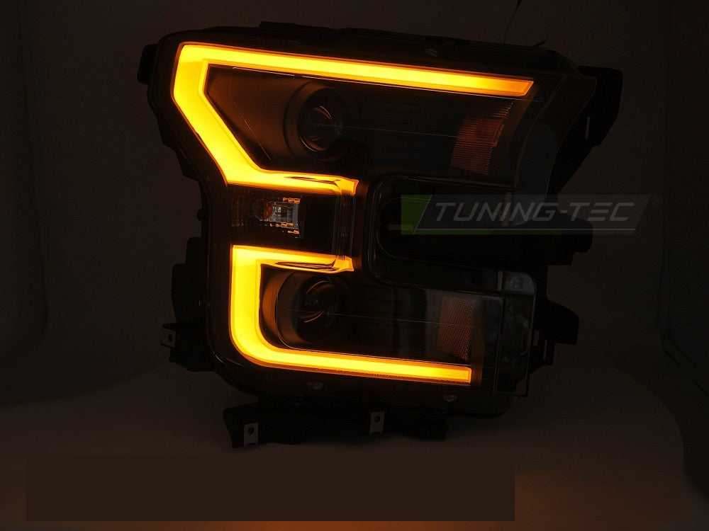 Detaljbilde av tube light-design i svart frontlykt for Ford F150 2014–2017