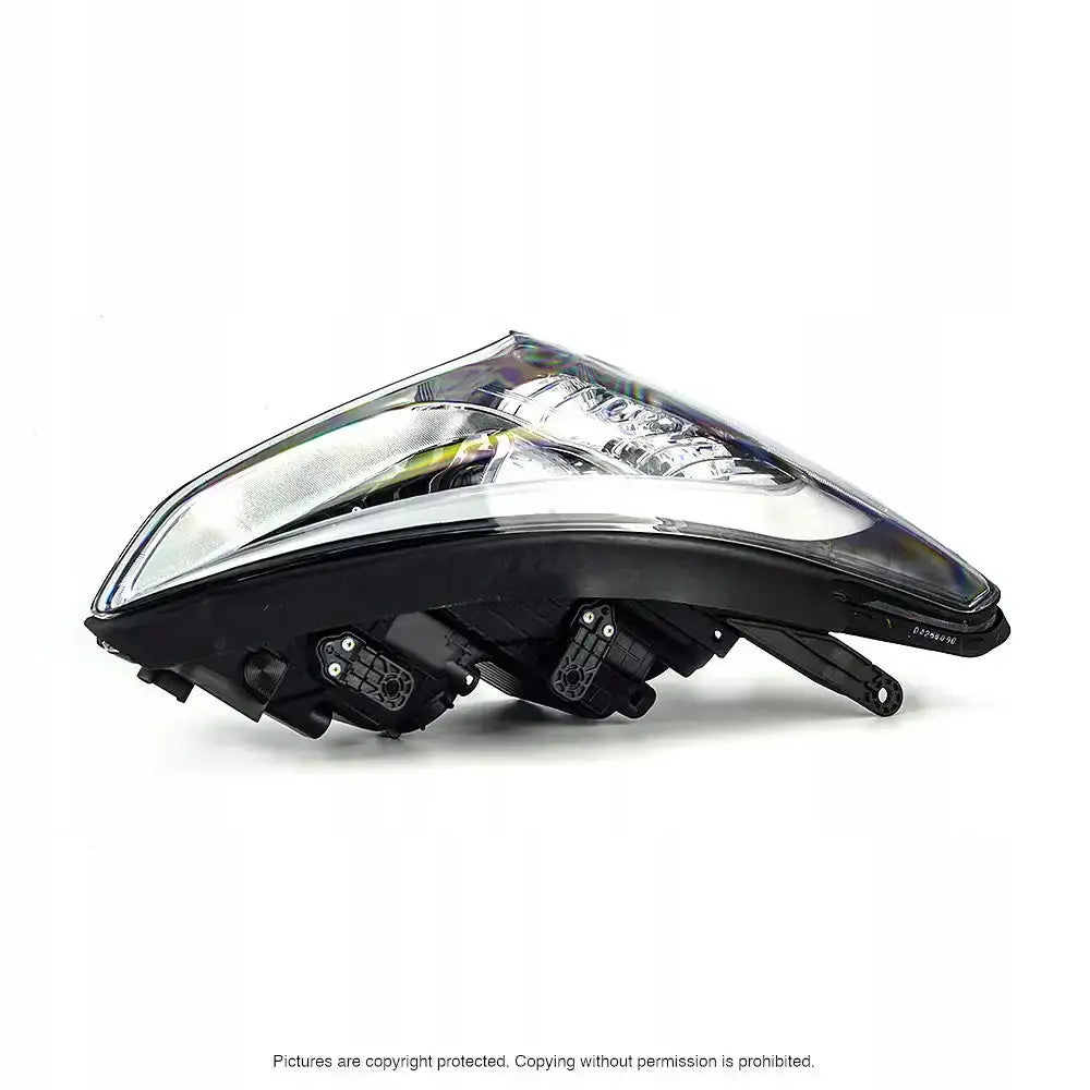 Frontlykter Hyundai Santa Fe 12-15 LED H7/H7 sett fra siden med synlige reflektorer og LED-elementer.