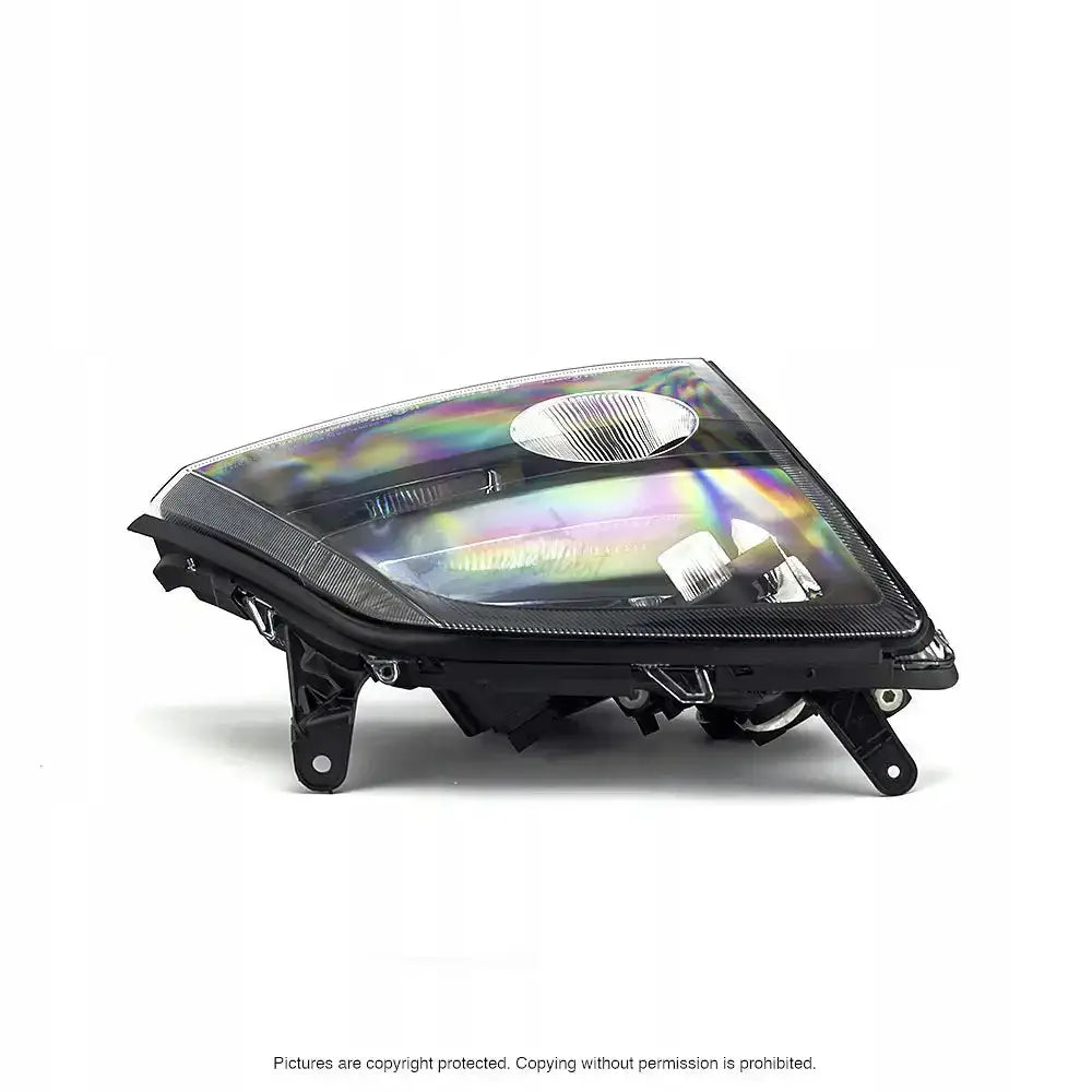 Frontlykter Opel Signum 02-05 H7 med klar plast, sorte detaljer og regnbueeffekt i glasset.