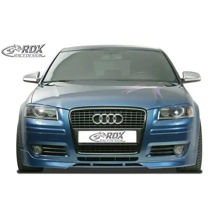 Frontspoiler Audi A3 8P 06-08 montert på blå bil med sorte grilldetaljer og RDX RaceDesign skilt.