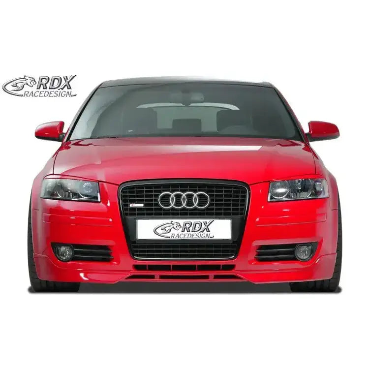 Front lip Audi A3 8P 06-08 sett forfra med svart grill og firedoble frontlykter mot hvit bakgrunn.