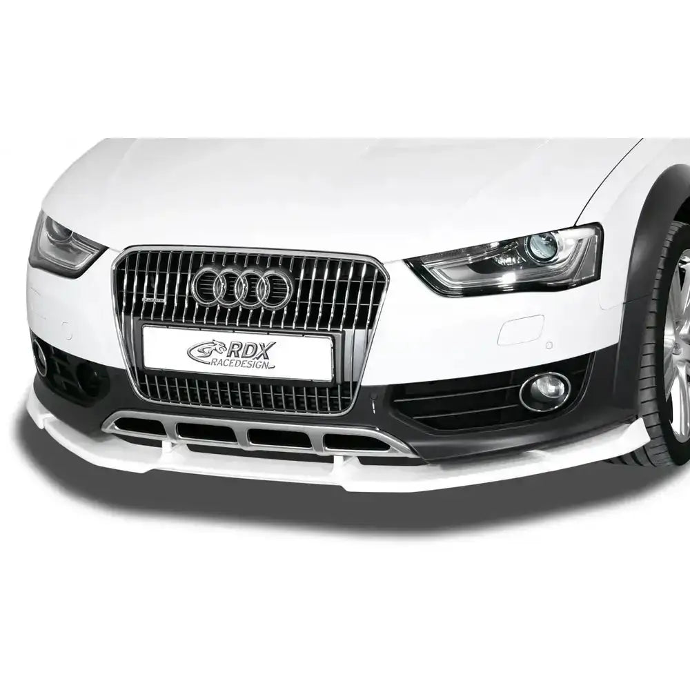 Frontleppe Audi A4 Allroad B8 montert på hvit bil, sett forfra med synlig grill og hovedlykter.