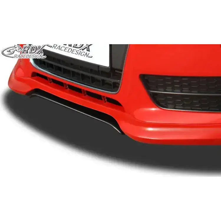 Frontspoiler til Audi A5 Coupe/Sportback vist i sort plast under rød støtfanger med grilldetaljer.