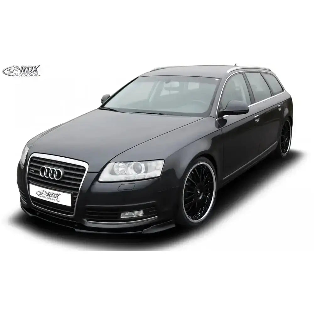 Frontspoiler Audi A6 4F 08-11 montert på svart stasjonsvogn med svarte felger og sølv takreling.