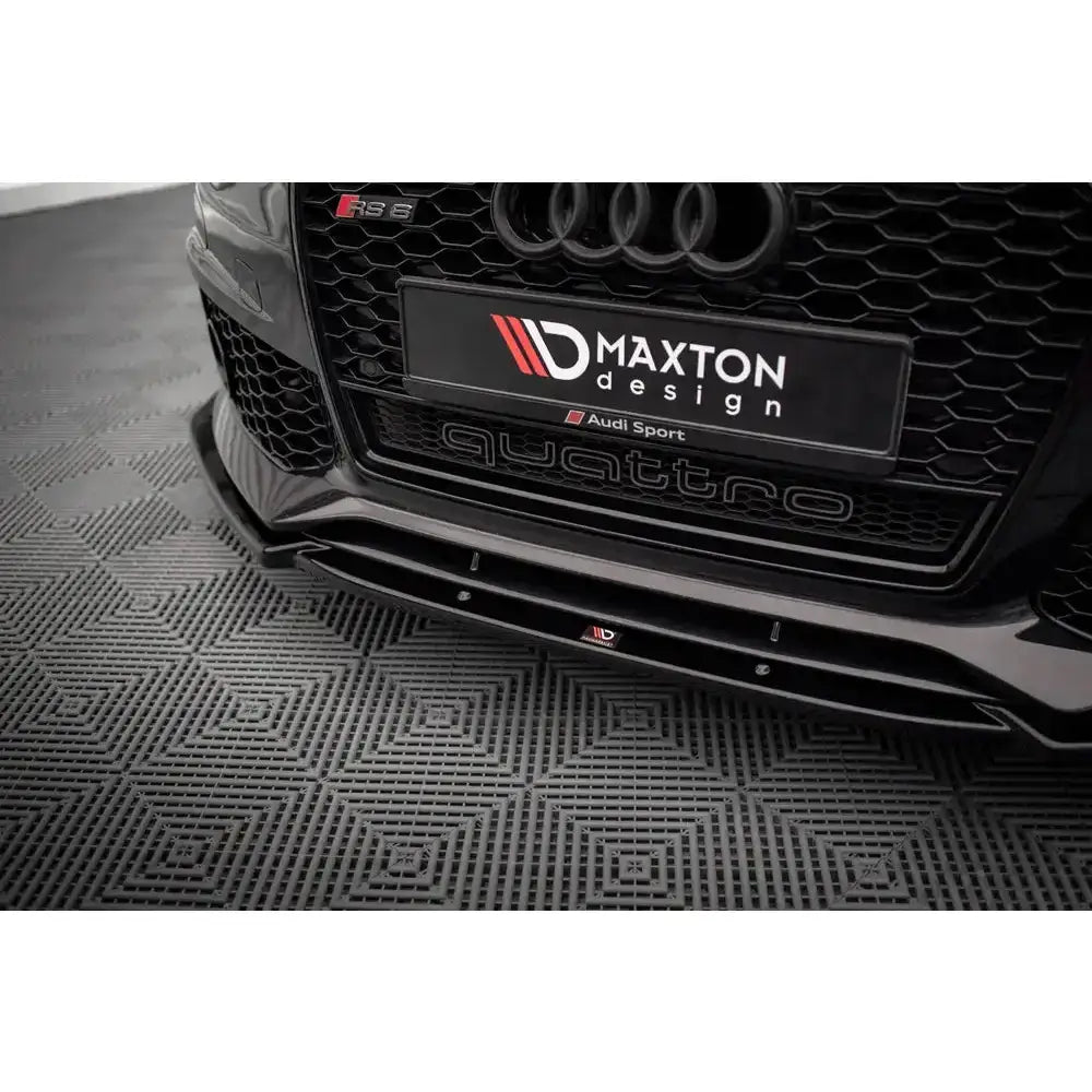 Front lip på Audi A6 RS6 Look C7, sort glanset frontleppe montert foran med quattro-emblem.