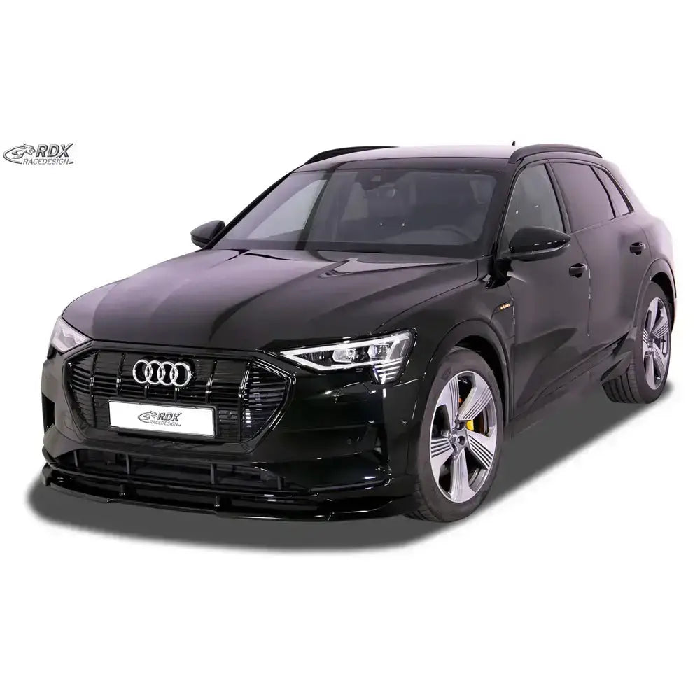 Frontspoiler Audi e-tron 18- Vario X montert på sort SUV med kromgrill og LED-frontlykter.