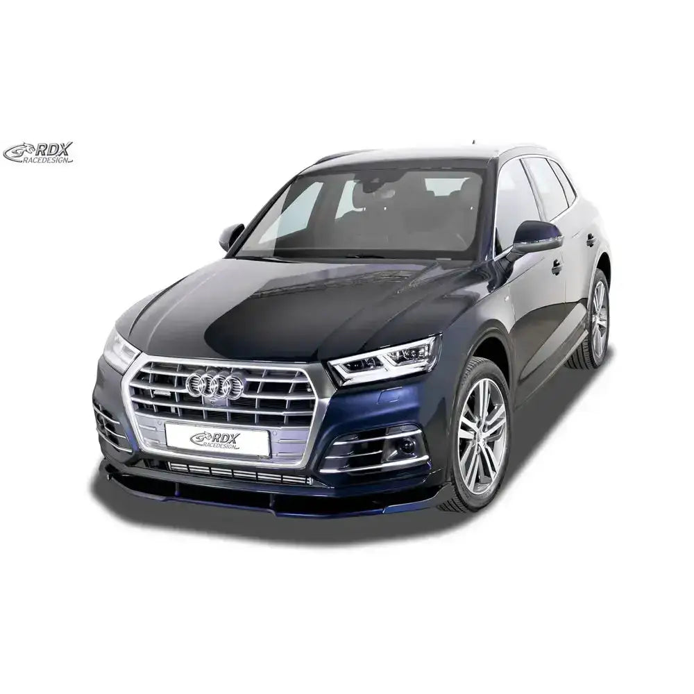 Frontspoiler Audi Q5 FY 17-20 S-Line på mørkeblå bil med sølvfelger og krom grill, gule detaljer.