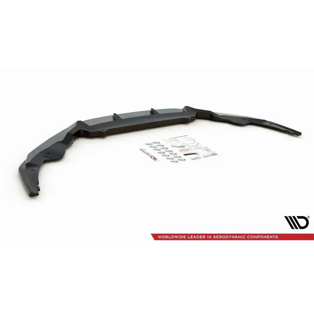 Frontspoiler Audi R8 Mk2 Facelift sort plast med monteringsutstyr og manual på hvit bakgrunn.