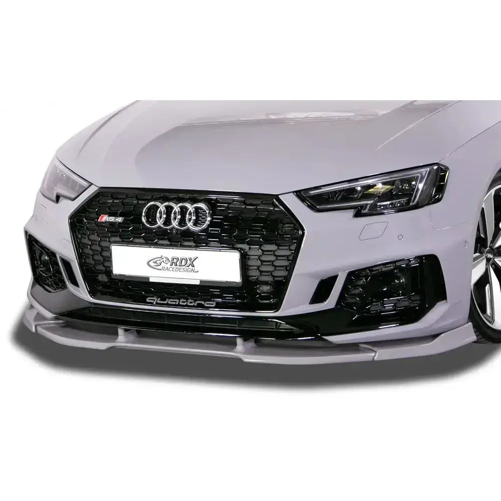 Frontleppe Audi RS4 B9 Vario X montert på hvit bil med sort grill og markert frontsplitter.