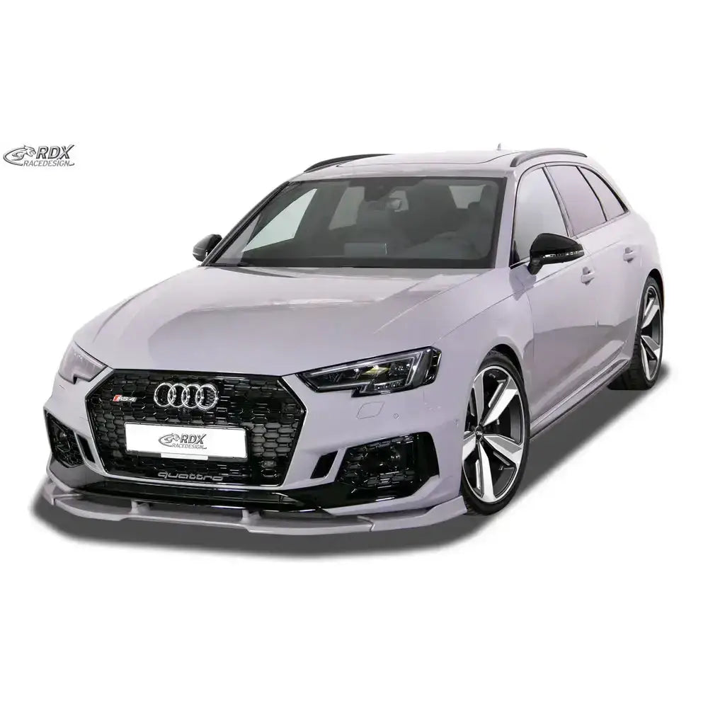 Frontspoiler på Audi RS4 B9 Vario X, skrå forfra med svarte detaljer og store aluminiumsfelger.