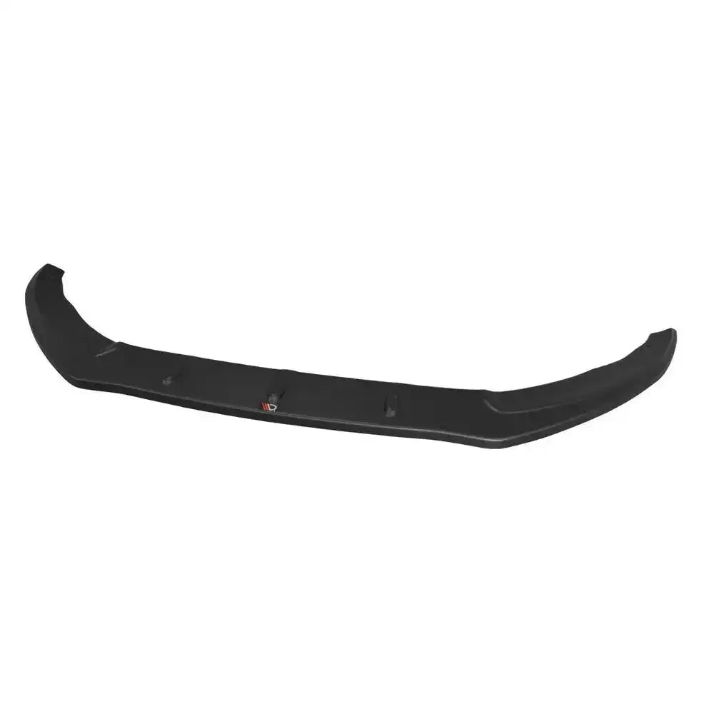 Frontsplitter Audi Rs5 8T sett rett forfra i sort plast med aerodynamisk design på hvit bakgrunn.