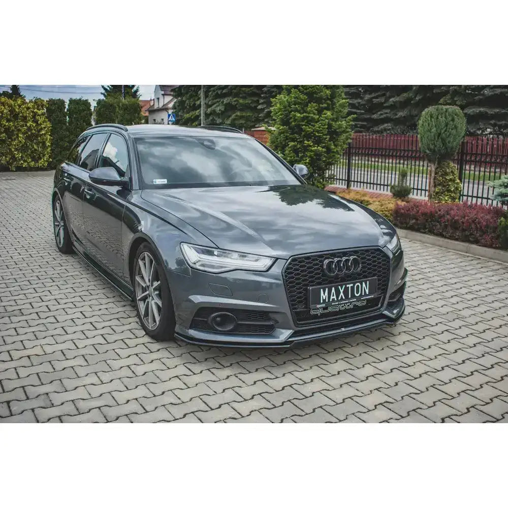 Frontsplitter på Audi S6 / A6 S-Line C7 FL med sportslig frontfanger og sort bikubemønstret grill.