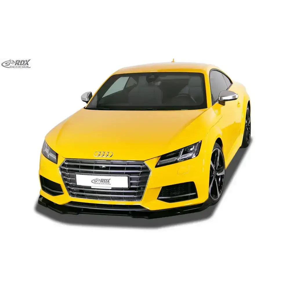 Frontspoiler Audi TT FV/8S 18- i svart montert på gul sportsbil med store felger og skarpe frontlykter.