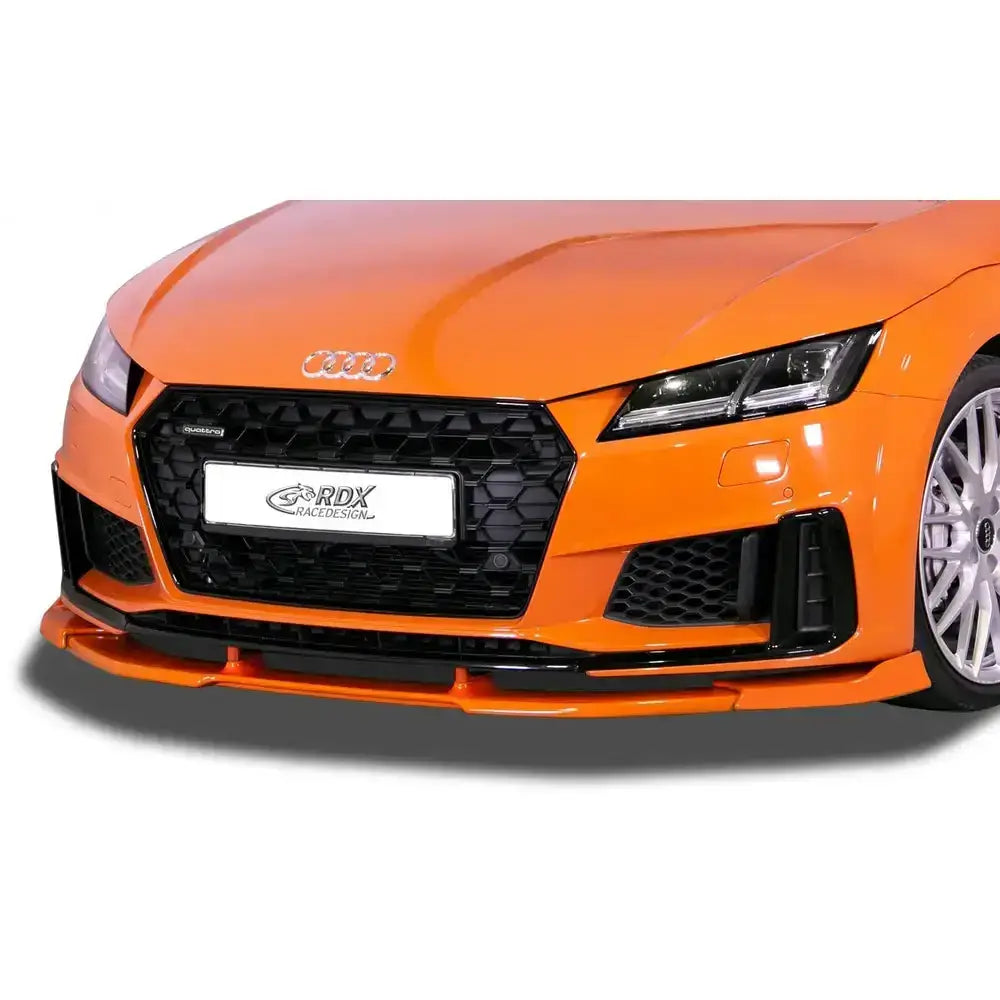 Frontleppe Audi TT FV/8S 18- S-Line, oransje bil med sort grill og markert leppe under fronten.