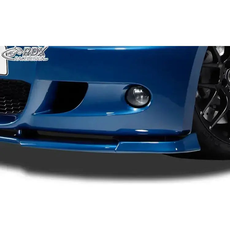 Front lip på BMW 1 E81/E87 M-Tech vist fra siden med blank spoiler, tåkelykt og felg synlig.