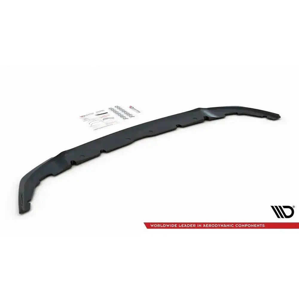 Frontleppe til BMW 1 F40 M-Pack, sort plast med monteringsutstyr og instruksjoner på hvit bakgrunn.