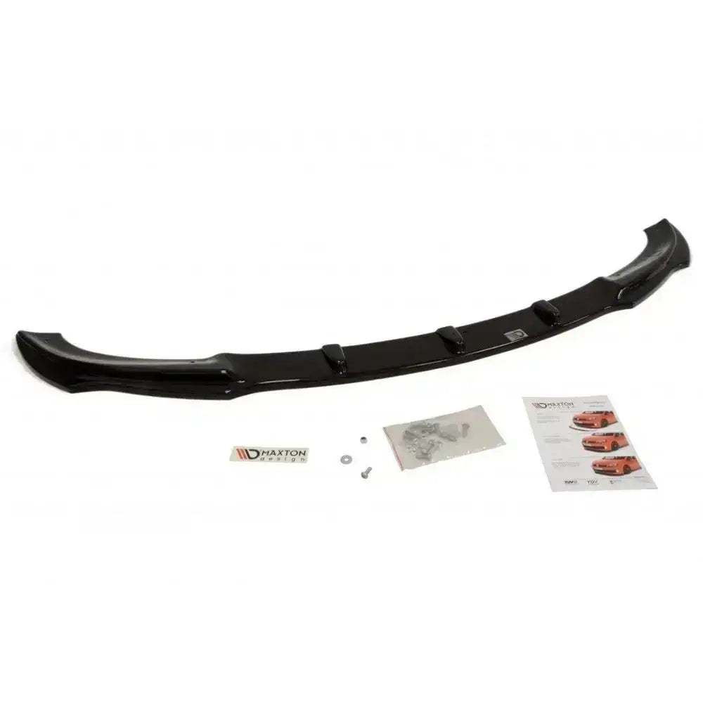 Frontspoiler til BMW 3 E46 Coupe sett ovenfra med montasjesett, bruksanvisning og klistremerke.