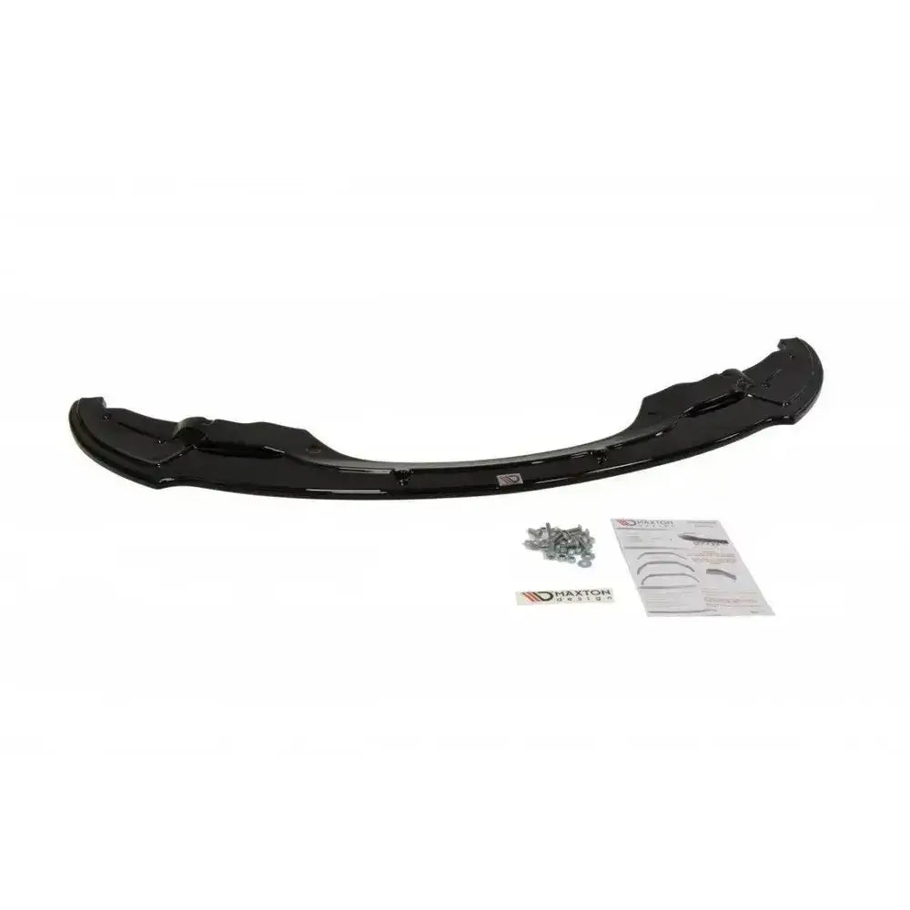 Front splitter til BMW 3 E92 Mpack i blank sort plast, sett ovenfra med skruer og instruksjonsark.
